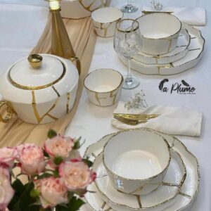 Service de table élégant doré – La Plume