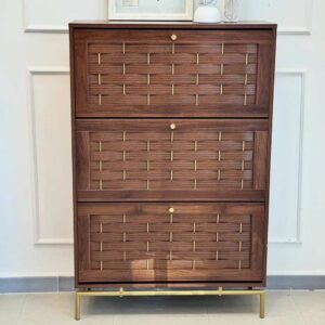 Meuble de rangement en bois foncé avec incrustations dorées