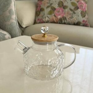 Théière en verre au design texturé avec couvercle en bois
